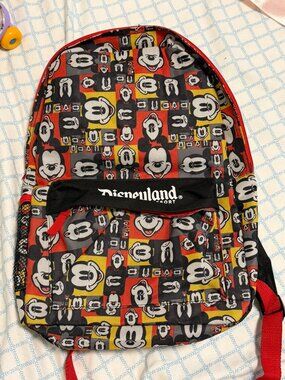 Well loved. Disneyland Mickey Head Printed Backpack.